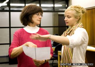 Theatre professor and acting chair of the department Nancy Helms (left) coaches undergrad Shannon Hamilton during a rehearsal on Sept. 25 in VL-126. Hamilton will be interpreting Layton’s 1963 poem <em>There Were No Signs</em> at the event. 